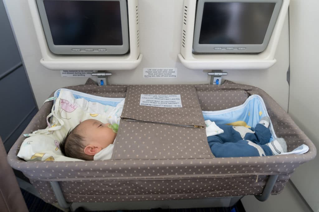 How This Mama Gets Her Baby to Sleep on an Airplane - The ...